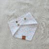 Fresh, fun, and full of color—this white multicolor dots dog bandana is handmade with soft Liverpool textured fabric and adjustable snaps for a perfect fit. A must-have for stylish pups.