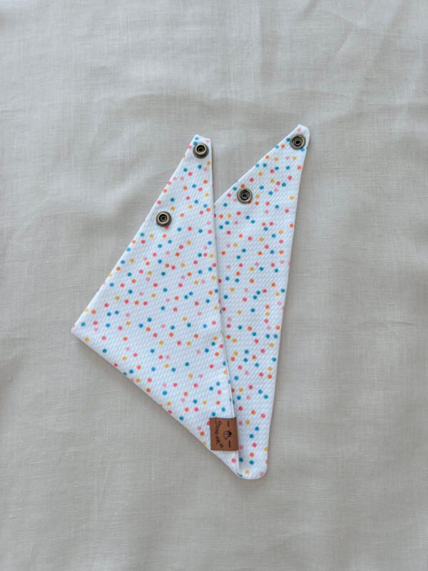 Fresh, fun, and full of color—this white multicolor dots dog bandana is handmade with soft Liverpool textured fabric and adjustable snaps for a perfect fit. A must-have for stylish pups.